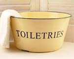 Yellow enamelware toiletries bowl